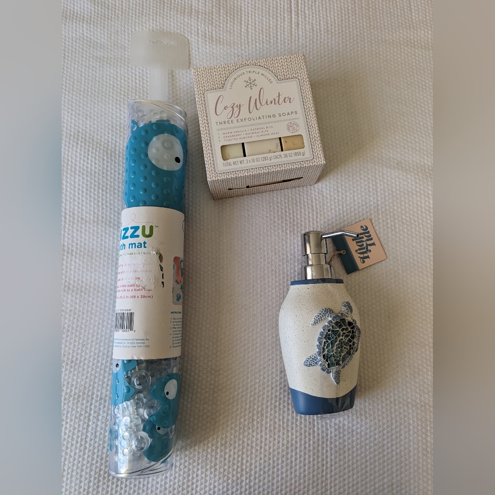 3 PC Bathroom accessories Mat soap dispenser and 3 exfoliating soap.